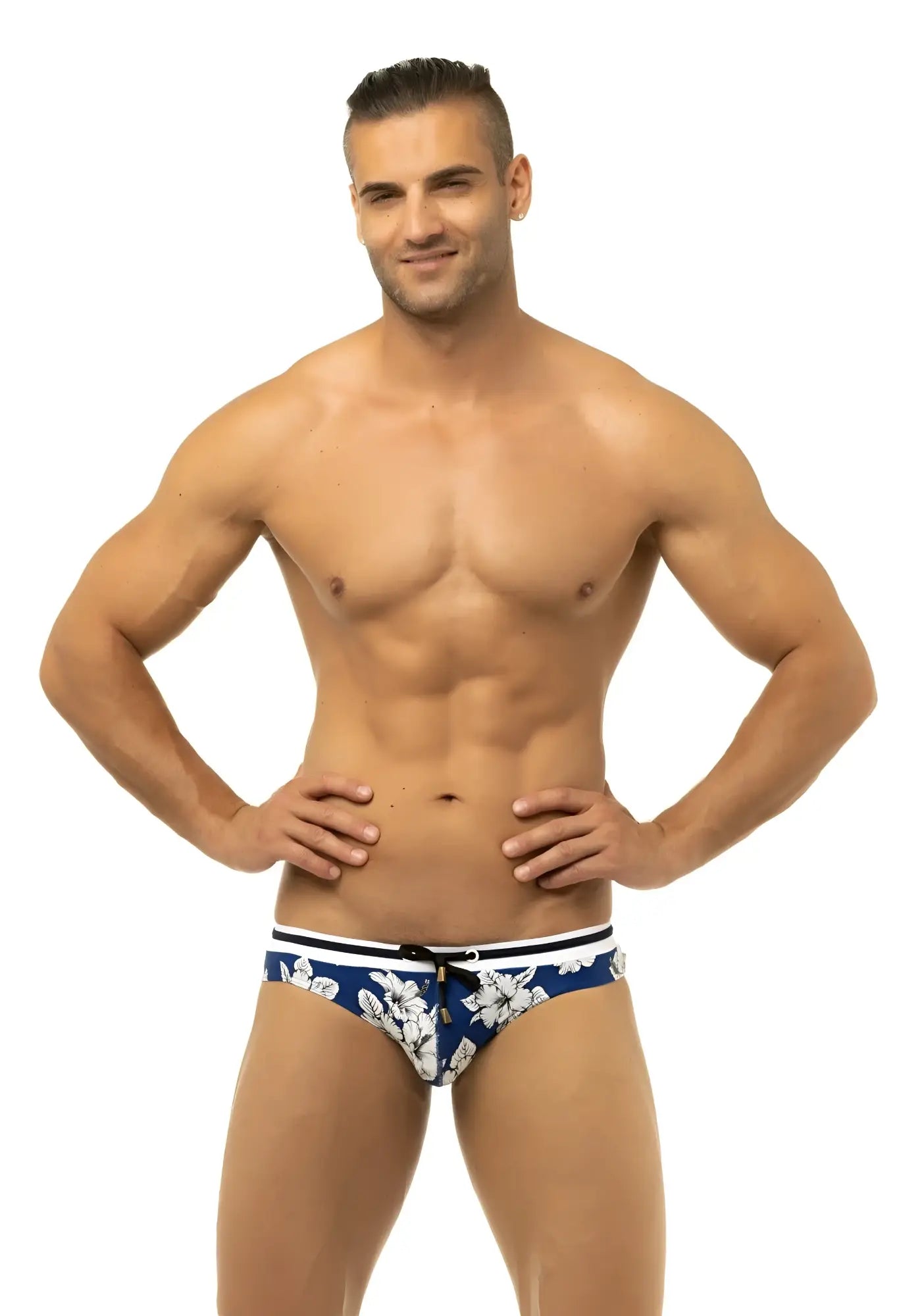 Blue swim trunks by marcuse botany with white floral pattern and black trim for stylish beachwear
