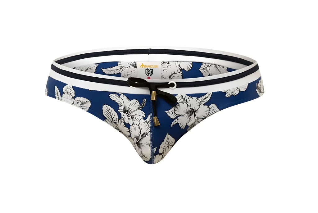 Marcuse Botany bikini swimwear blue and white floral patterned swim trunks with black trim and drawstring closure