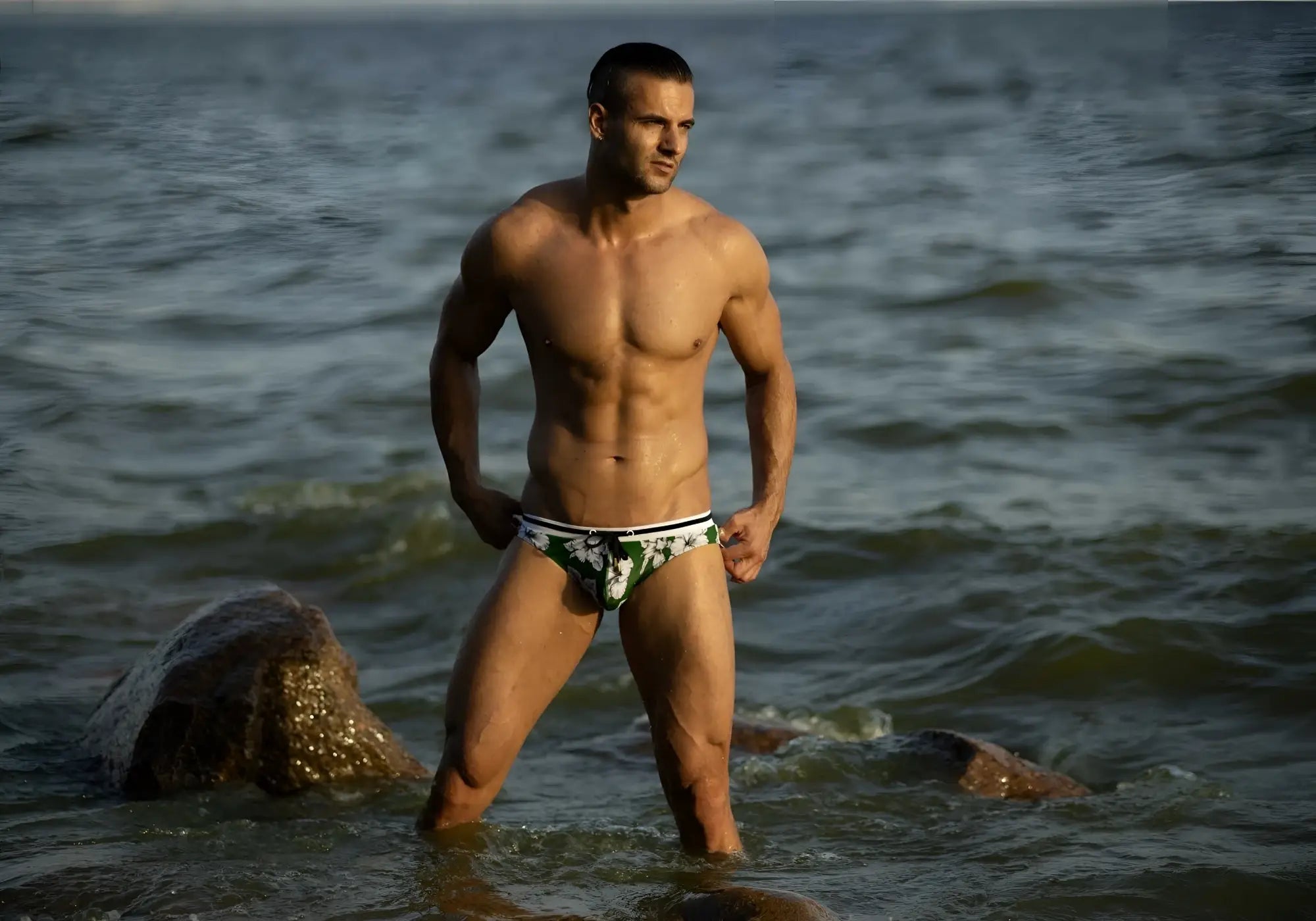 Green and white floral patterned swim trunks from Marcuse Botany bikini swimwear perfect for beachwear