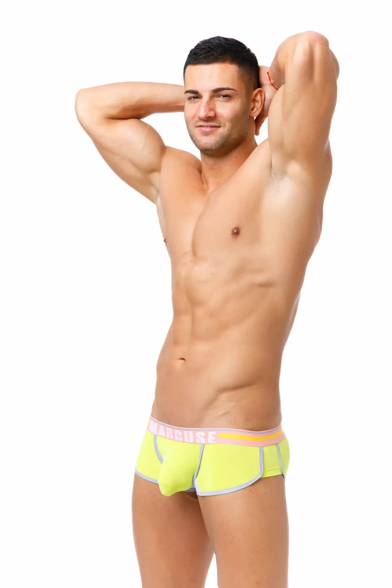 Marcuse bounce boxer briefs in bright neon green with a pink and yellow striped waistband for active wear