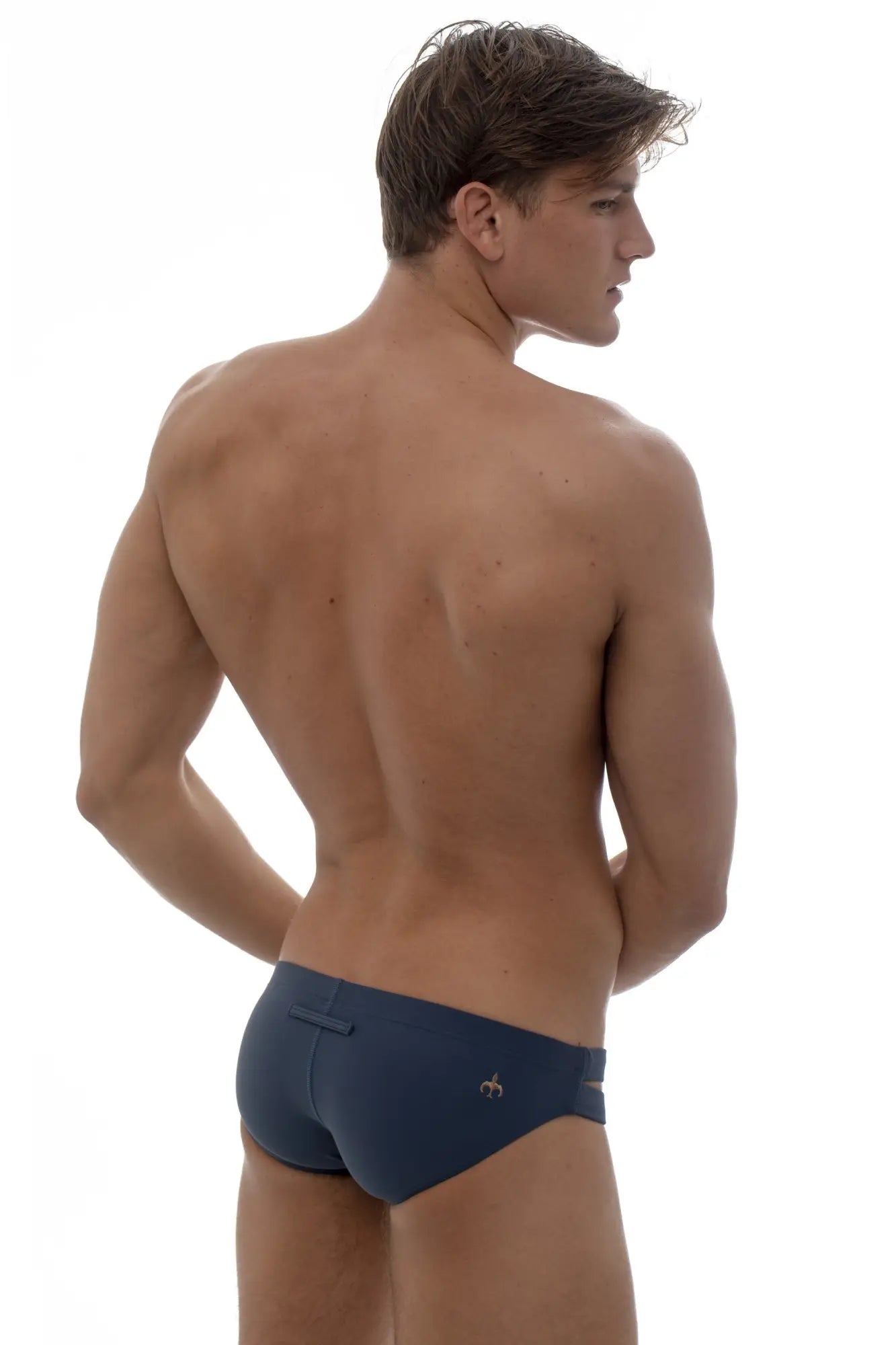 Marcuse Bound bikini swimwear navy blue swim trunks with small gold logo on the side for stylish beachwear