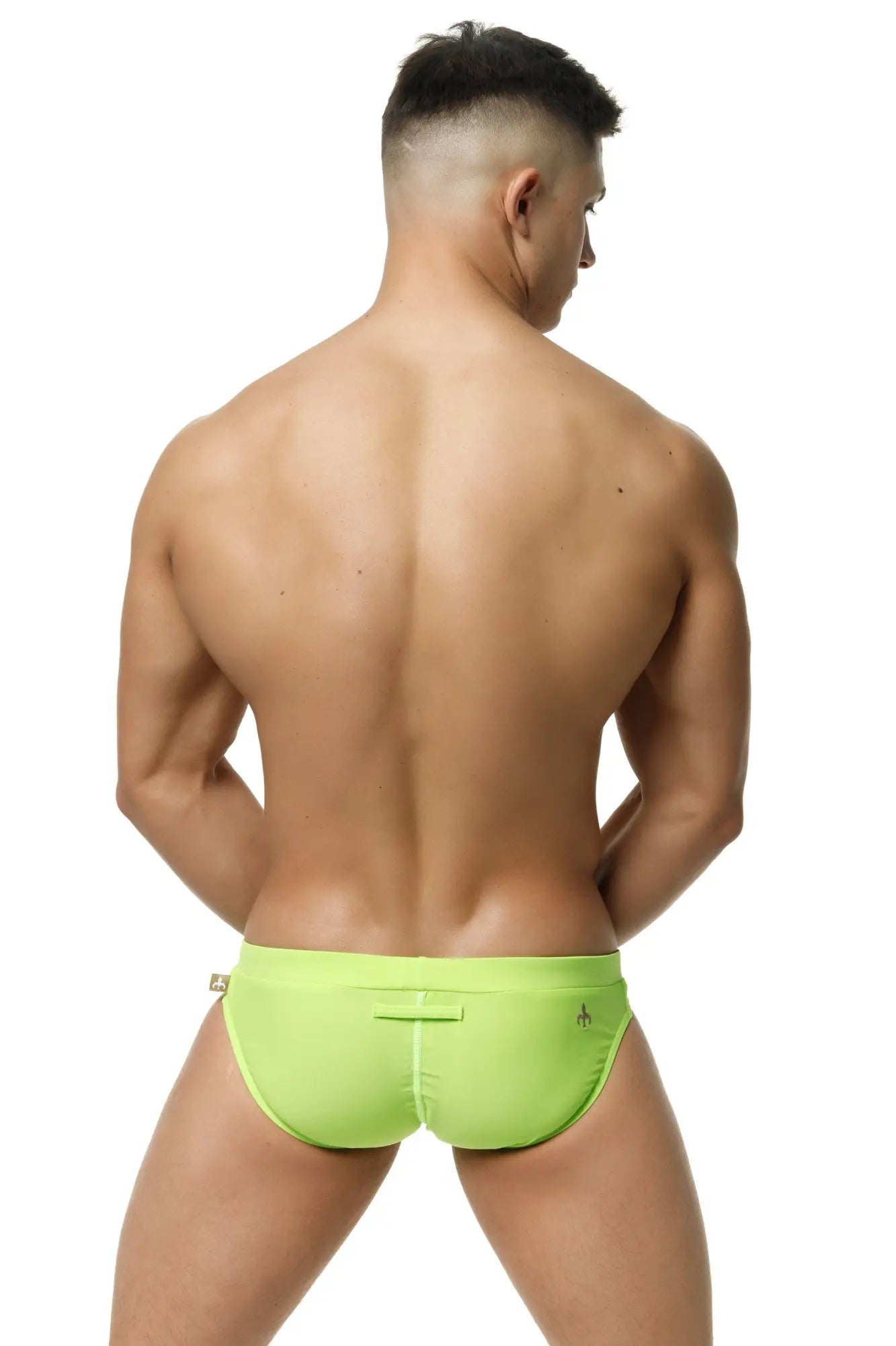 Bright lime green marcuse burleigh bikini swimwear swim trunks with sleek form-fitting design and subtle side branding