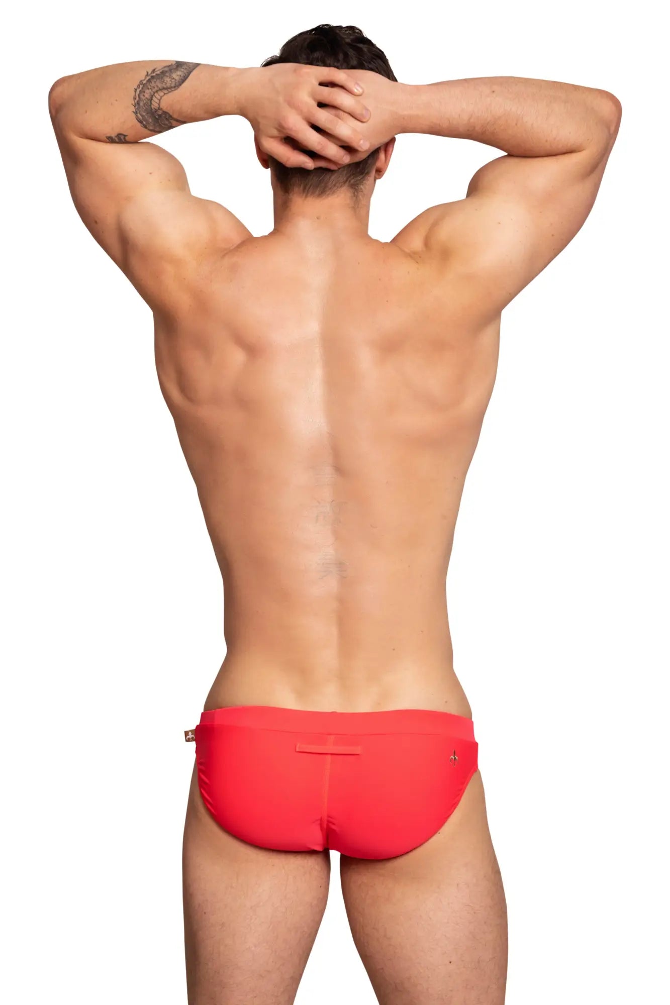 Bright red marcuse burleigh bikini swimwear with sleek form-fitting design and subtle metallic side accents