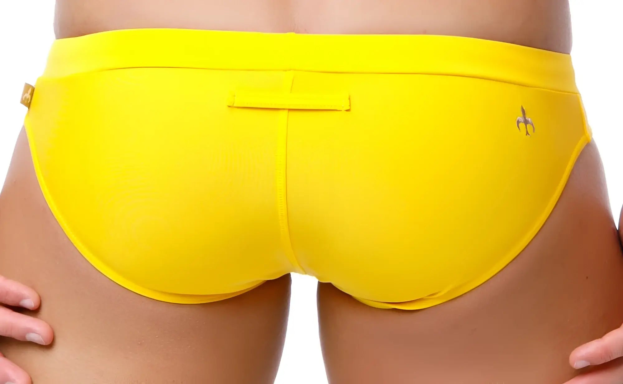 Bright yellow marcuse burleigh bikini swimwear with sleek form-fitting swim trunks and small metallic hip logo