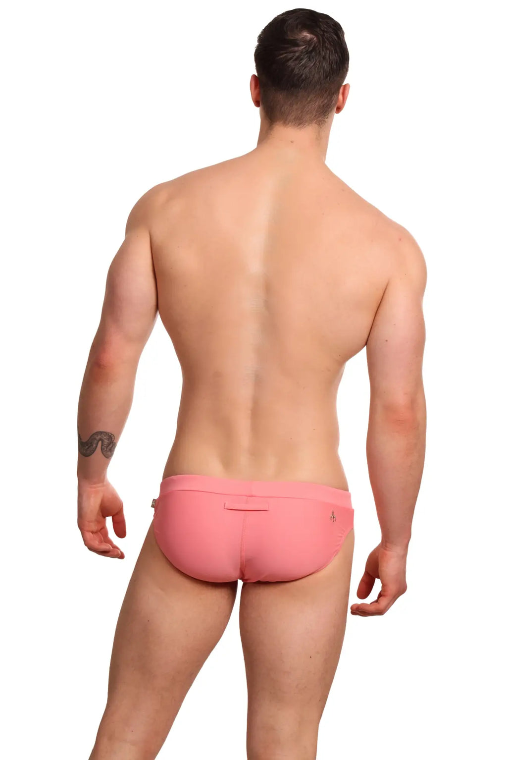 Back view of pink marcuse burleigh bikini swimwear briefs with subtle seam detail ideal for athletic use
