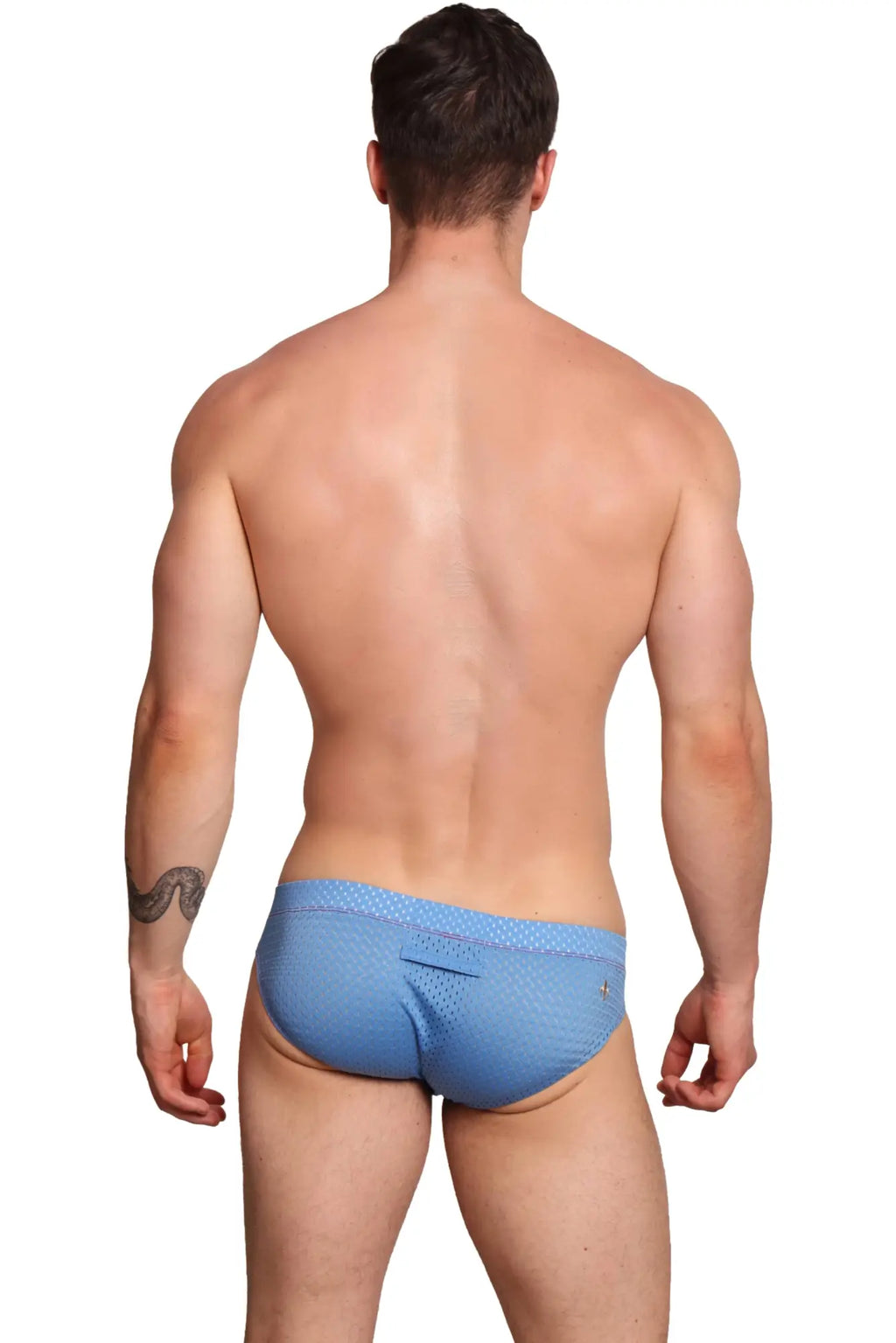 Light blue textured fabric briefs with subtle pattern and small logo on waistband marcuse bussine brief underwear