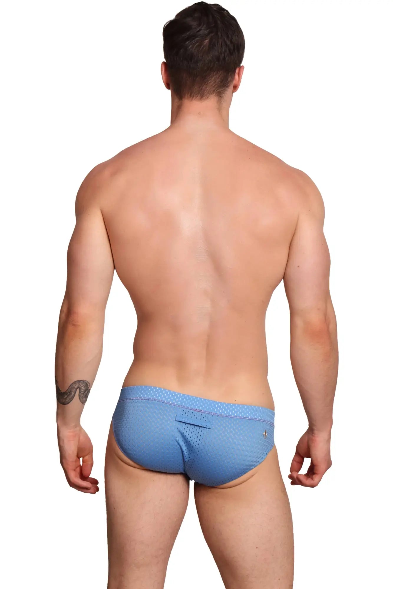 Light blue textured fabric briefs with subtle pattern and small logo on waistband marcuse bussine brief underwear