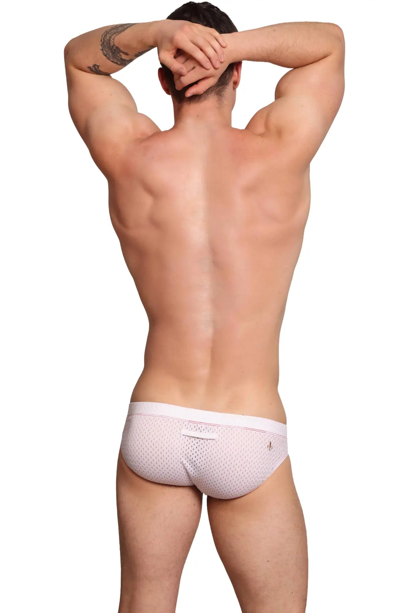 Marcuse Bussine brief underwear in light pink mesh with subtle textured pattern and a small side logo