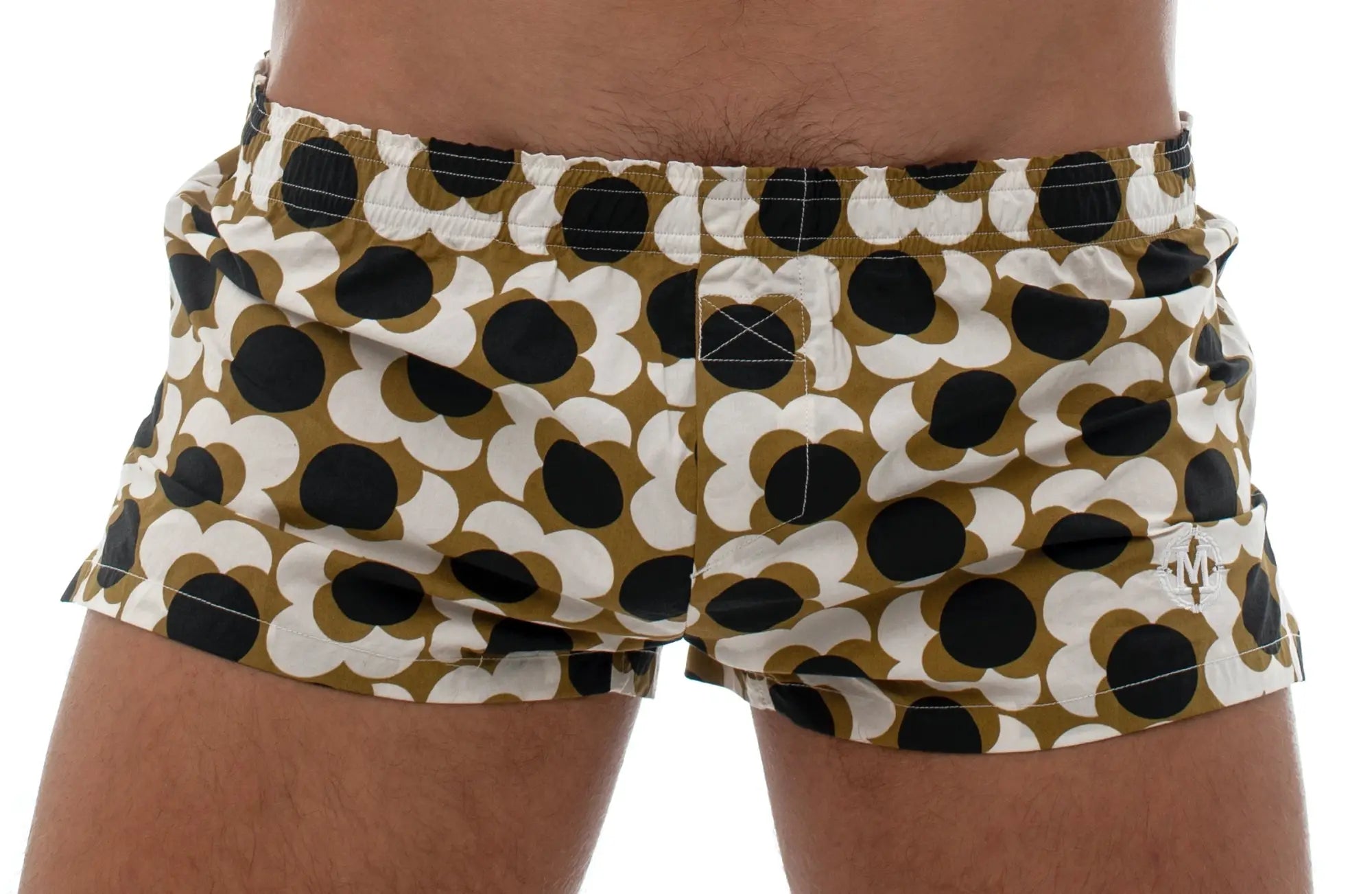 Marcuse Caleçon boxer underwear featuring brown and white floral swim trunks with black circular accents