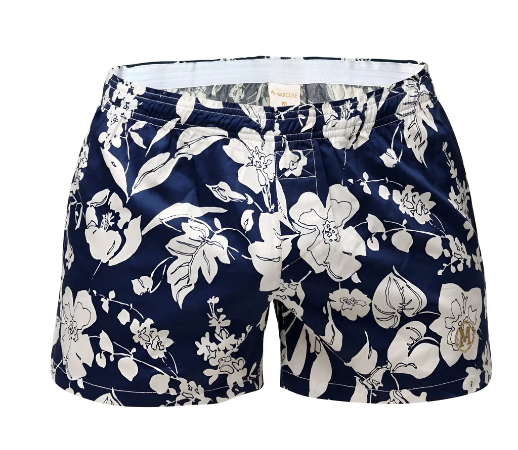 Navy blue floral marcuse caleçon+ boxer underwear with white and cream blossoms and a subtle gold logo on the leg