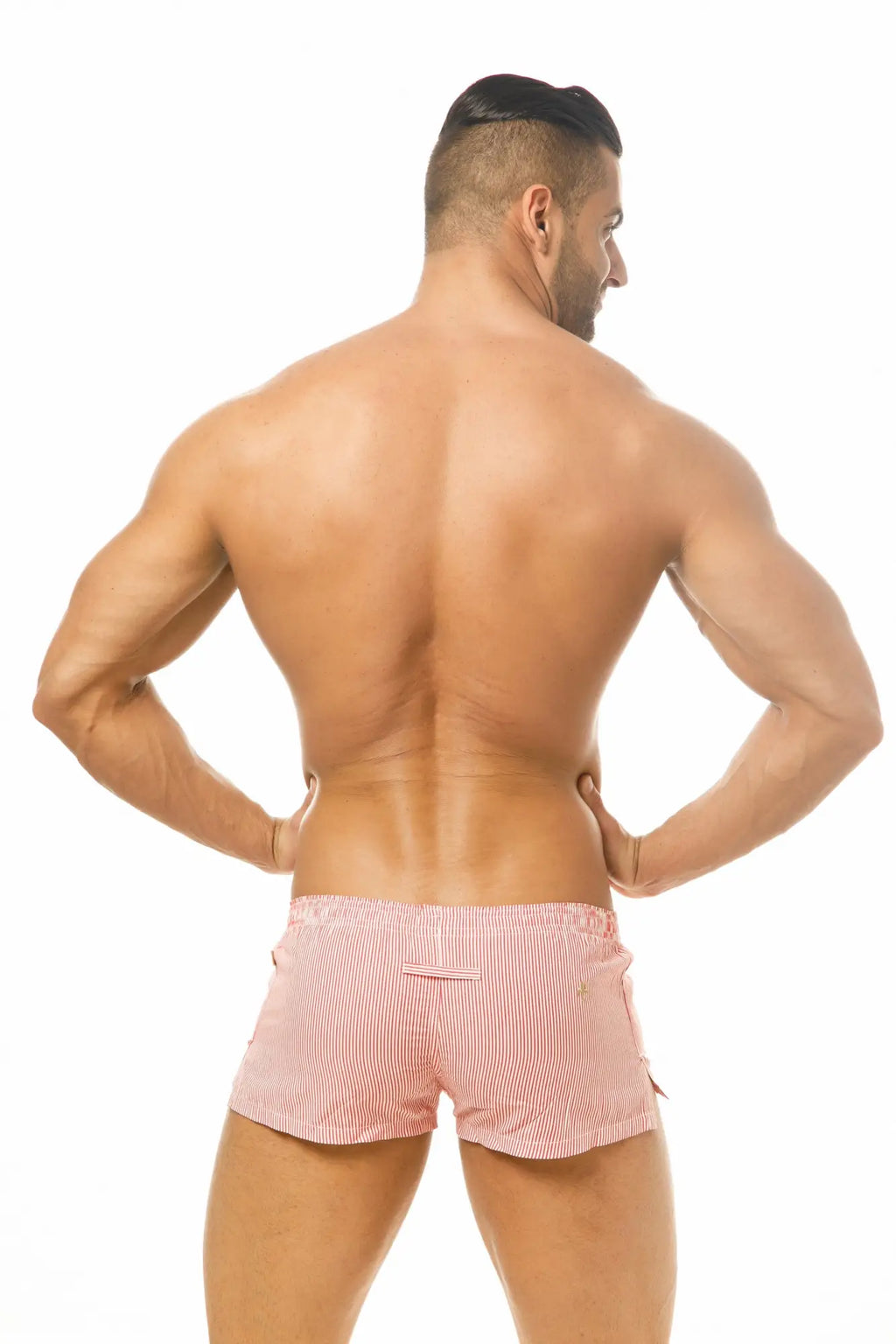 Pink and white striped marcuse caleçon boxer swim trunks with small front pocket for casual beachwear