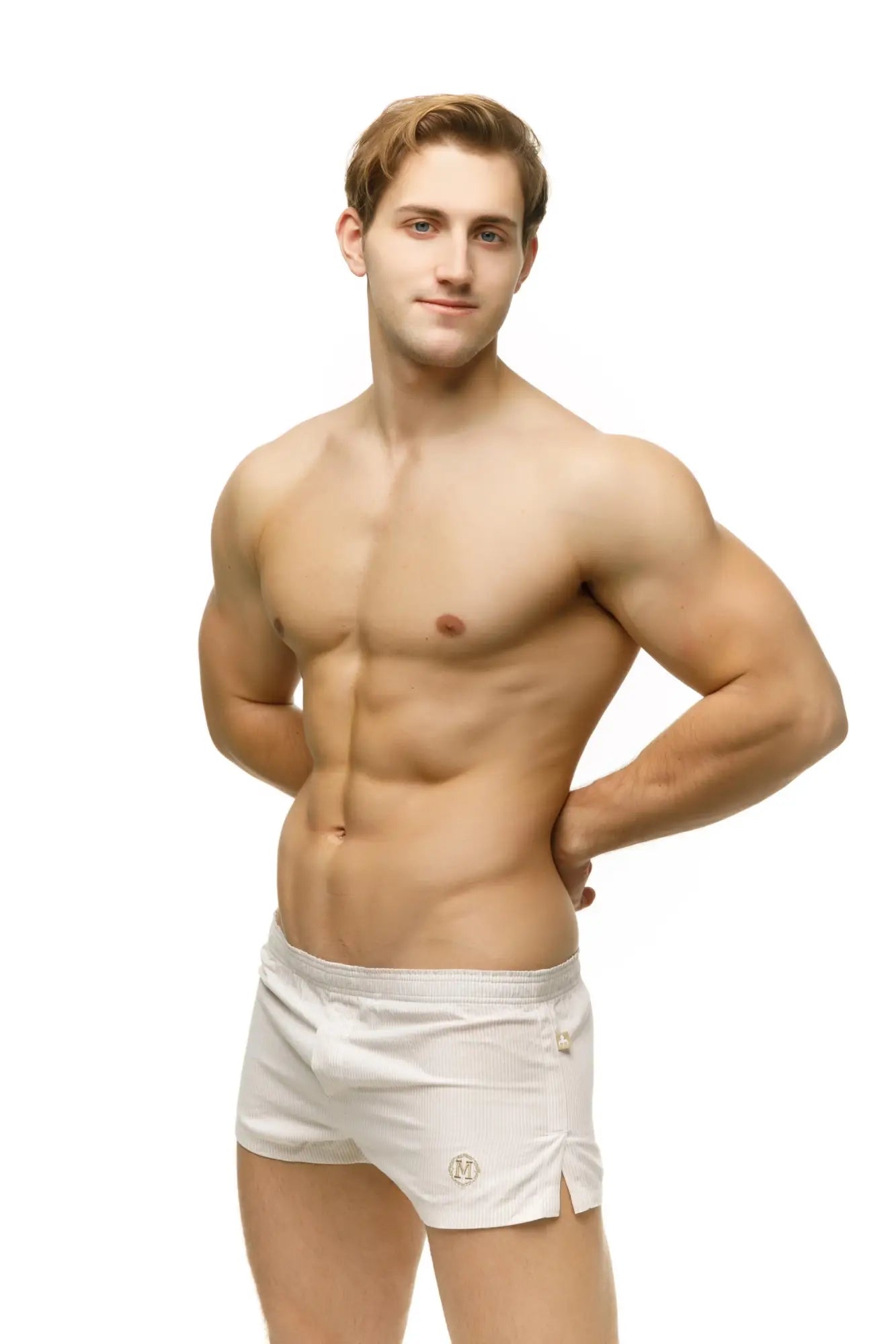 White marcuse caleçon boxer underwear with subtle striped texture and small embroidered logo on lower left leg