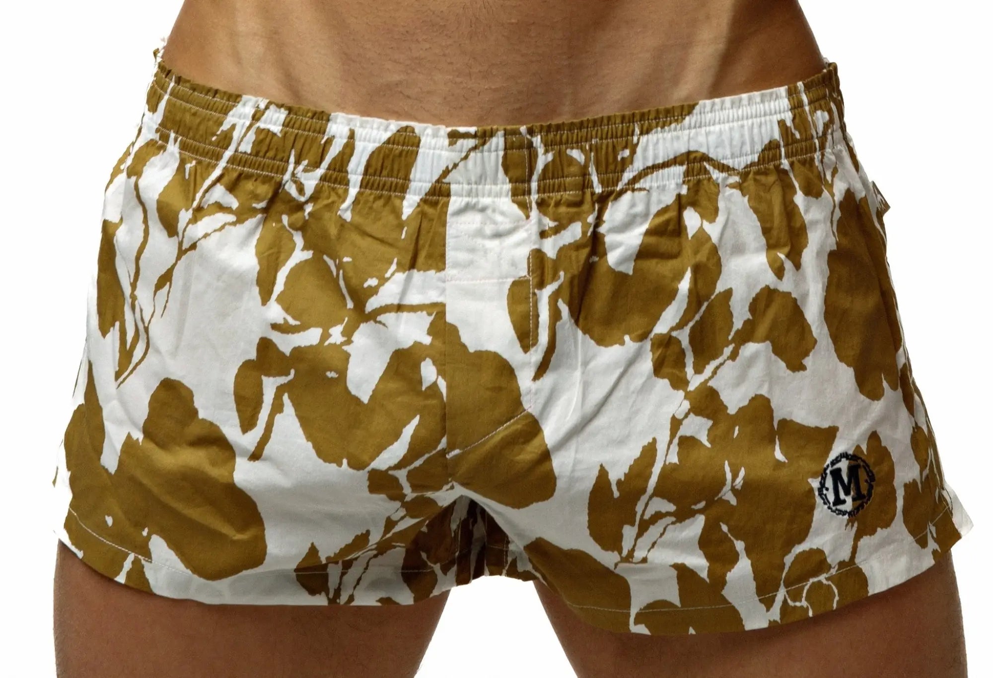 Marcuse Caleçon boxer underwear with white and gold leaf-patterned swim trunks and black embroidered logo on leg