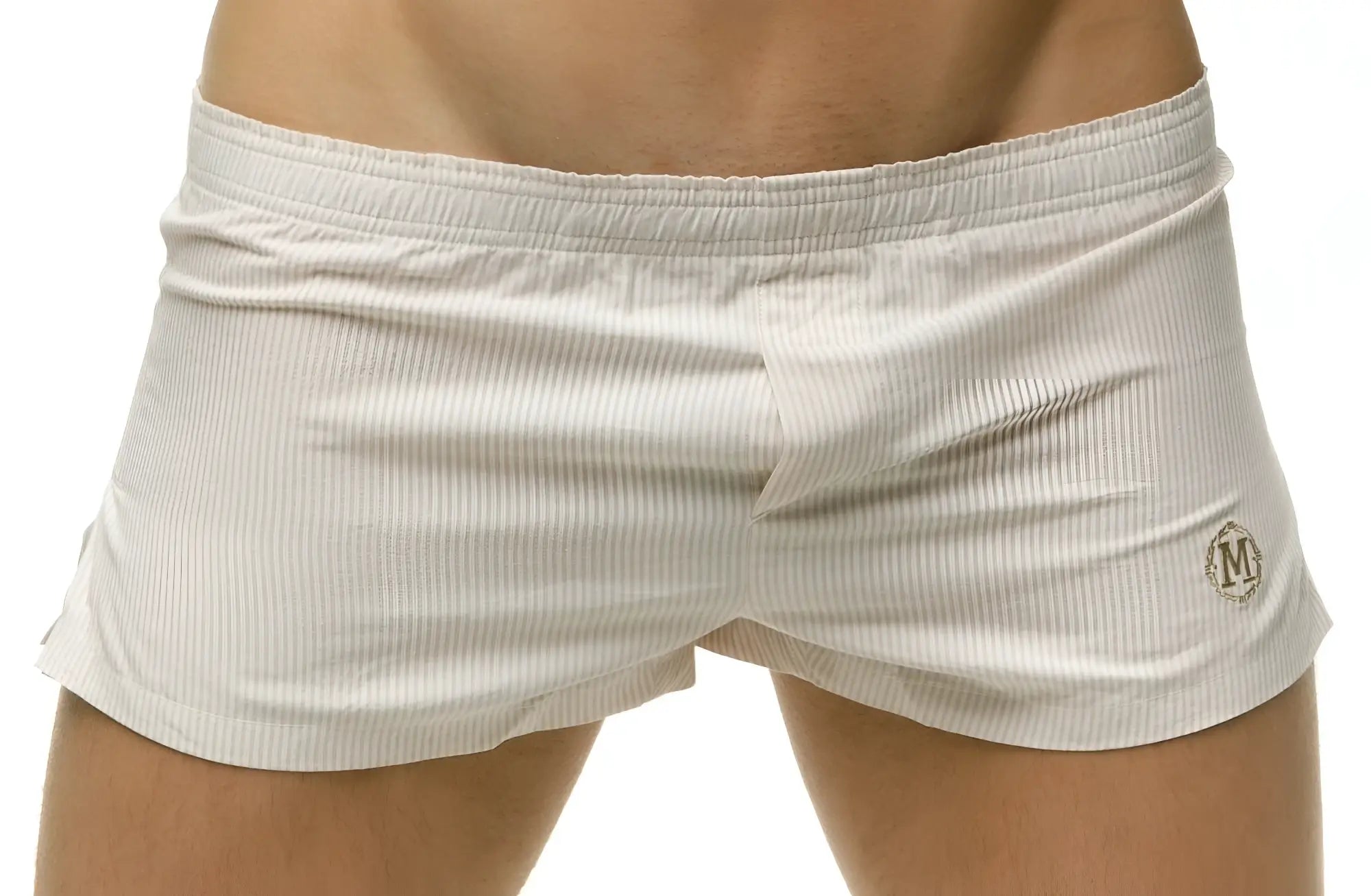 White striped men’s Marcuse Caleçon boxer underwear with subtle ribbed texture and embroidered logo on the lower right leg