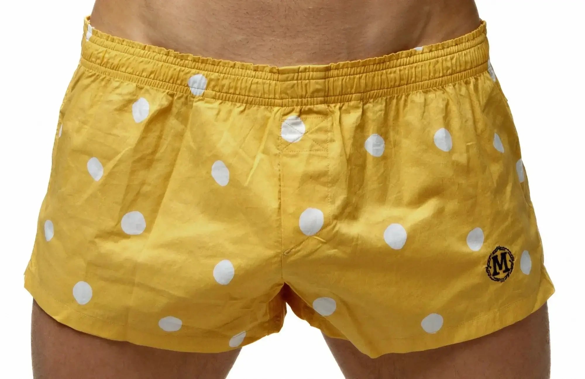 Marcuse Caleçon boxer underwear in yellow polka-dot swim trunks with black embroidered logo on lower right leg