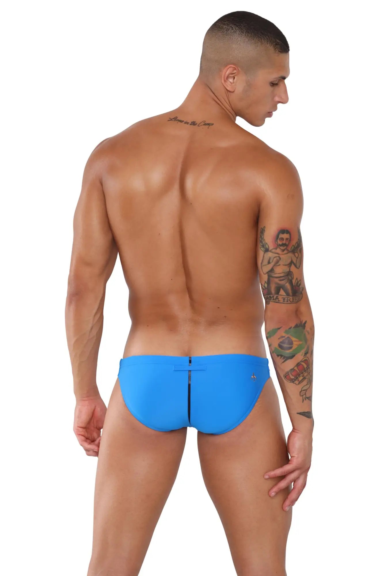 Bright blue marcuse cosmo sleek one-piece swim trunks with central zipper detail for stylish swimwear look