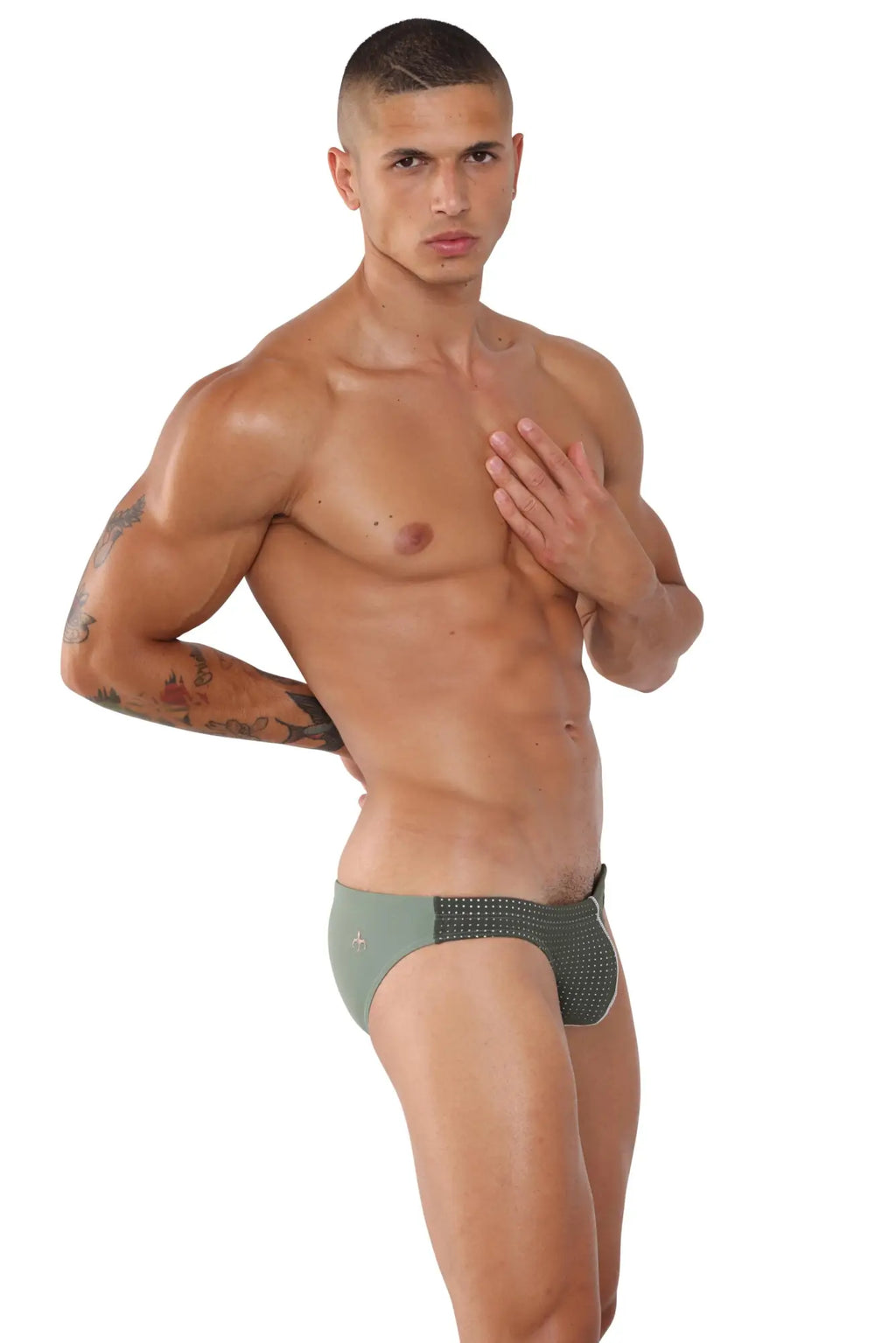 Olive green and black patterned marcuse cosmo bikini swimwear briefs with textured perforated front panel design