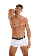 White men’s briefs with a black elastic waistband featuring the marcuse brand name from marcuse dandy boxer underwear
