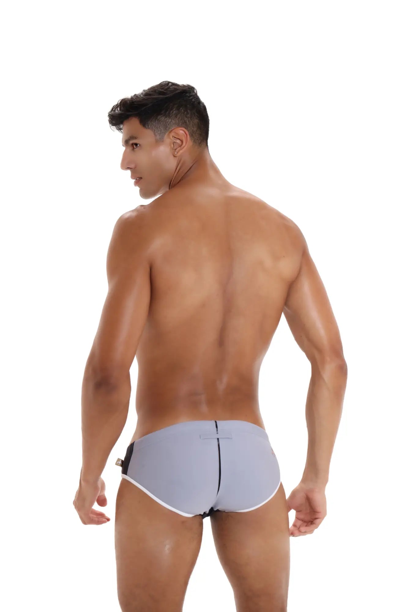 Light gray Marcuse efficio bikini swimwear trunks with white trim and black side accent for swimming and beachwear