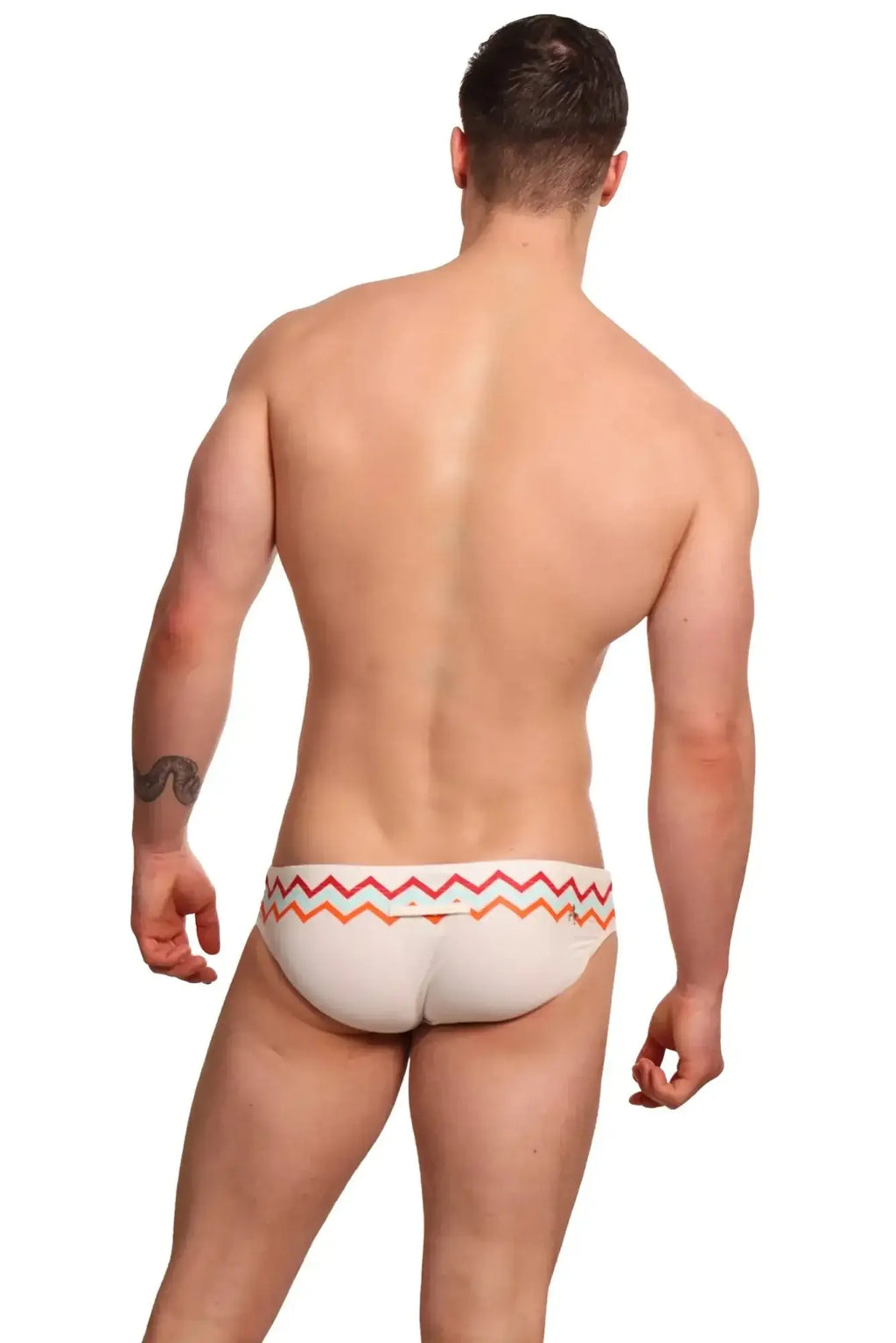 White Marcuse Everest bikini swimwear briefs with colorful pink orange and red zigzag waistband pattern