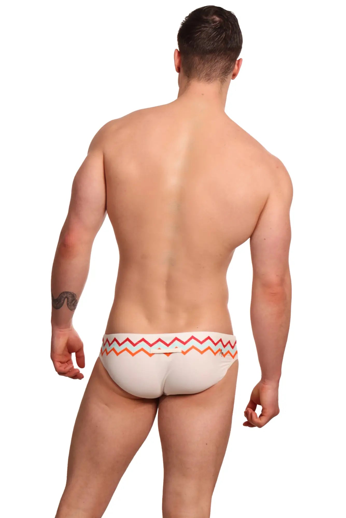 White Marcuse Everest bikini swimwear briefs with colorful pink orange and red zigzag waistband pattern