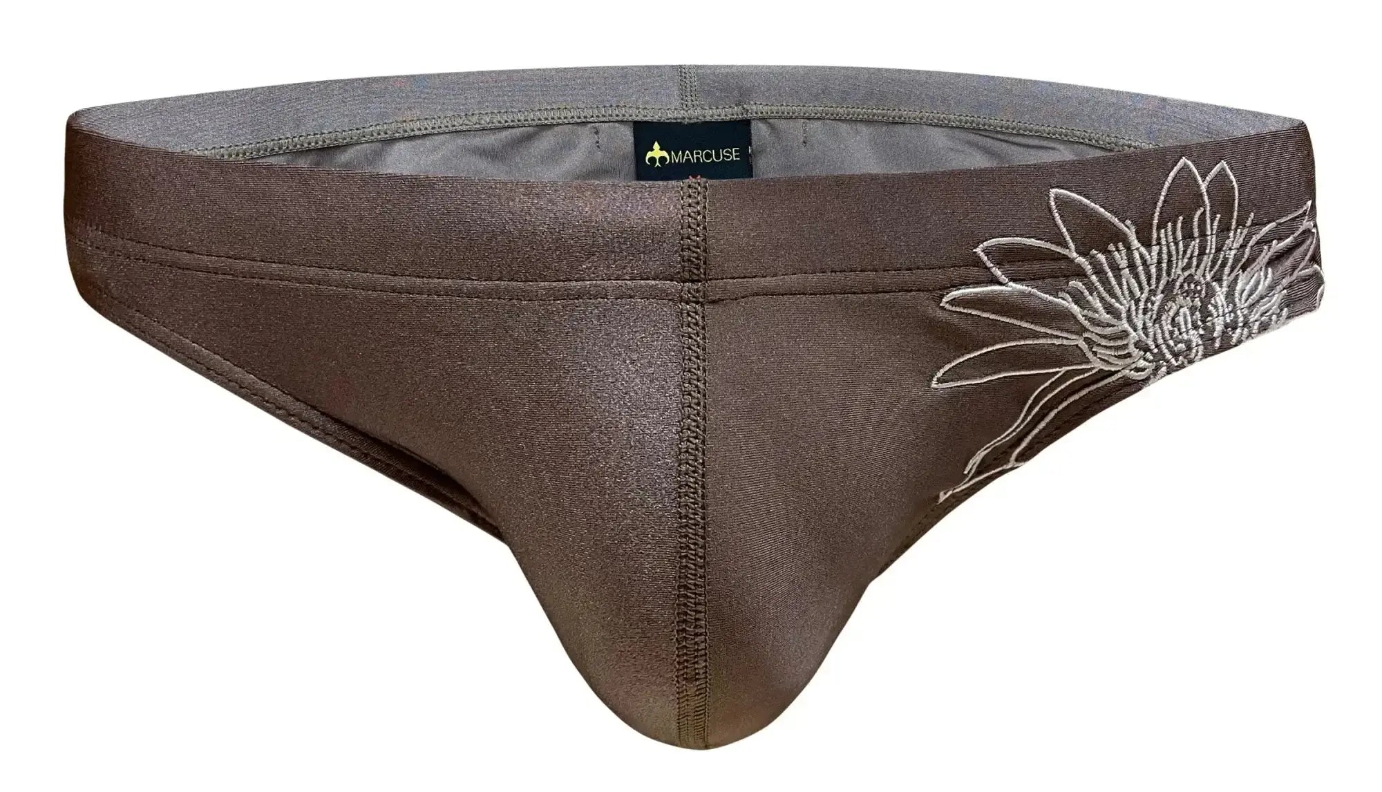 Brown marcuse briefs with white embroidered sunflower design on the side from marcuse florets bikini swimwear