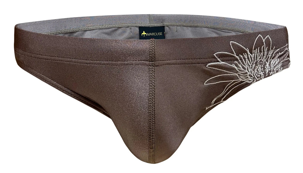 Brown marcuse briefs with white embroidered sunflower design on the side from marcuse florets bikini swimwear