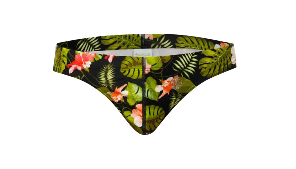 Black Marcuse Forrest Brief swimwear bottom with vibrant green leaves and pink flowers tropical print