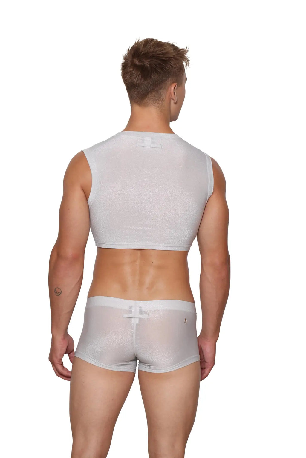 Back view of marcuse glisten crop tank in white sheer mesh with bow detail and matching shorts with bow on waistband