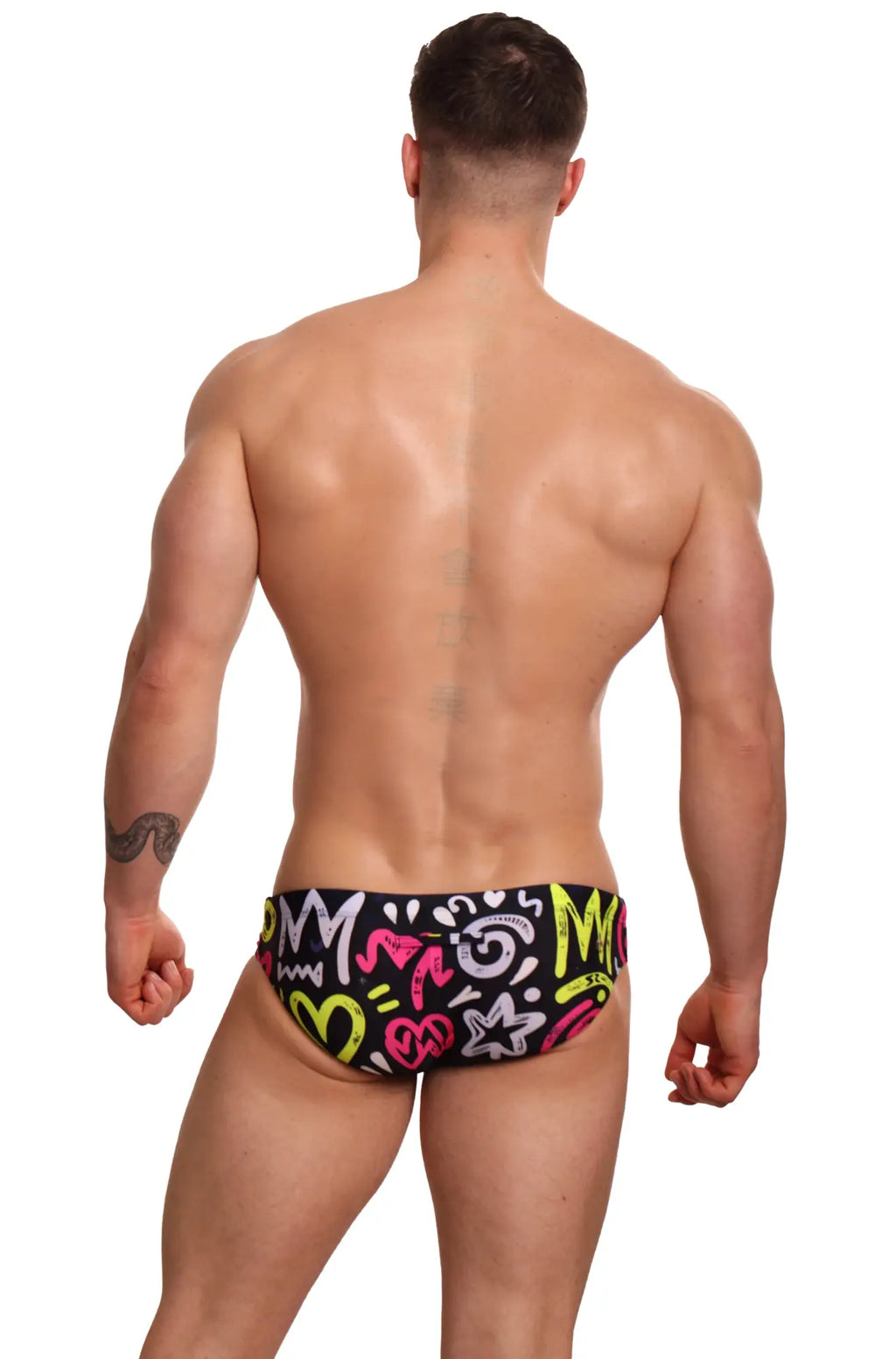 Black Marcuse Haider bikini swimwear trunks with vibrant neon yellow pink and white graffiti style pattern