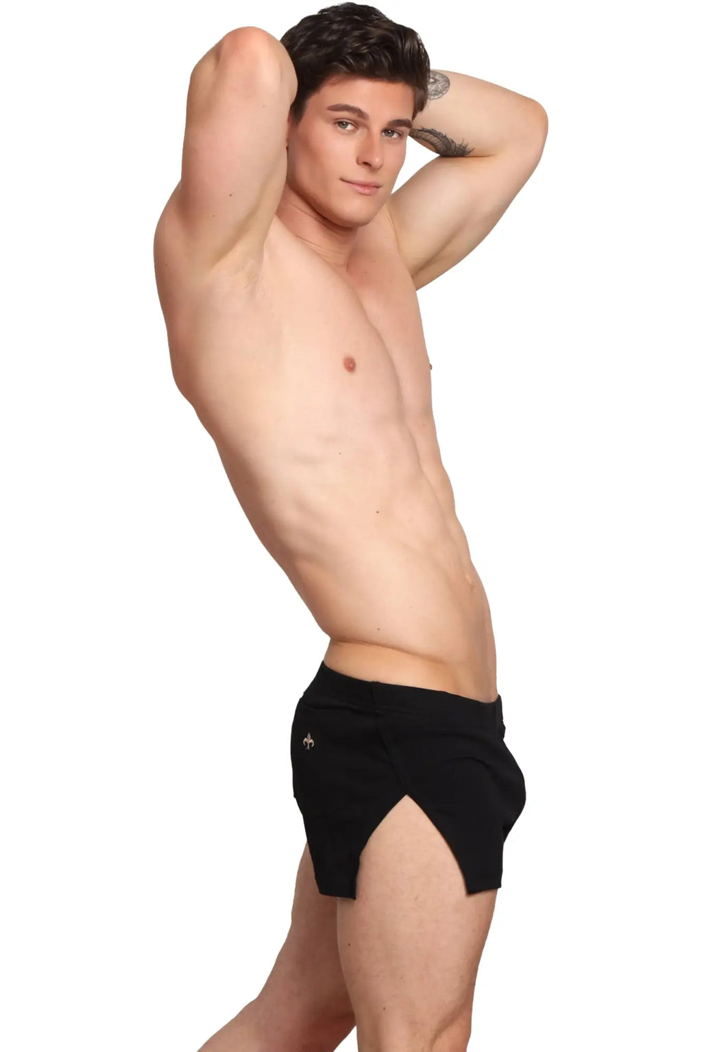 Black Marcuse Hansar athletic shorts with side slit and small gold logo on left hip for active wear