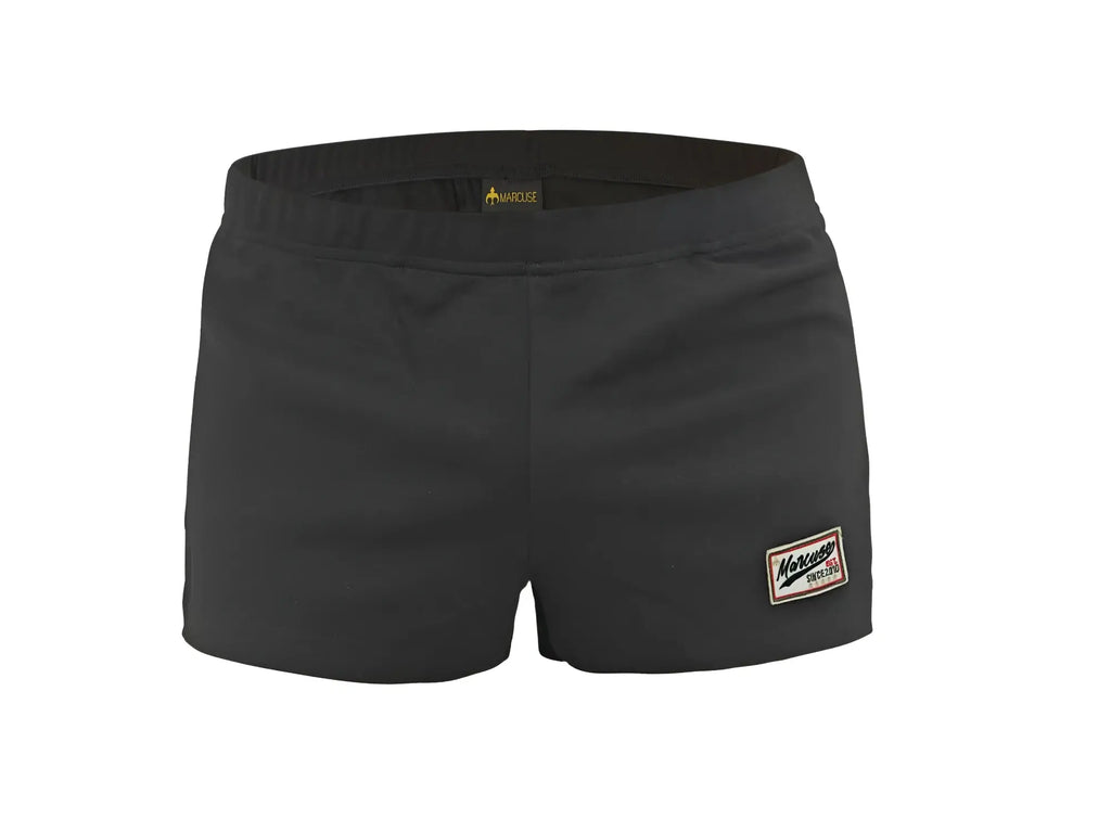 Black women’s marcuse hansar shorts with elastic waistband and rectangular morrison patch on lower right leg