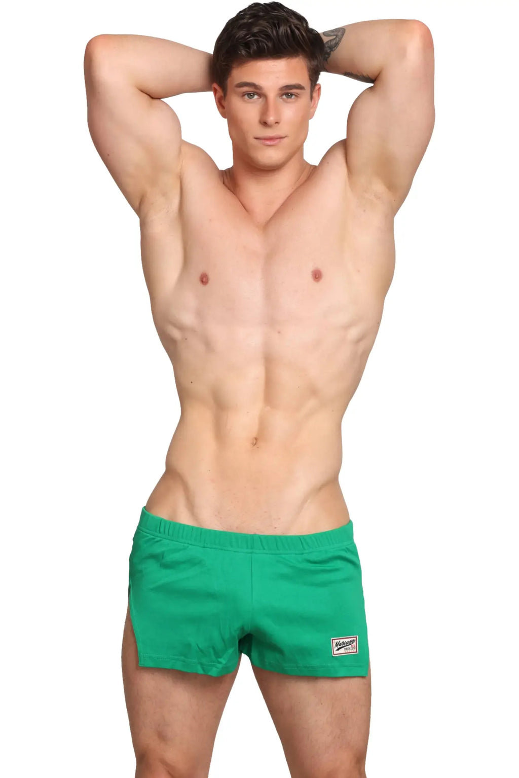 Bright green marcuse hansar athletic shorts with a small white logo patch on the lower right leg front view