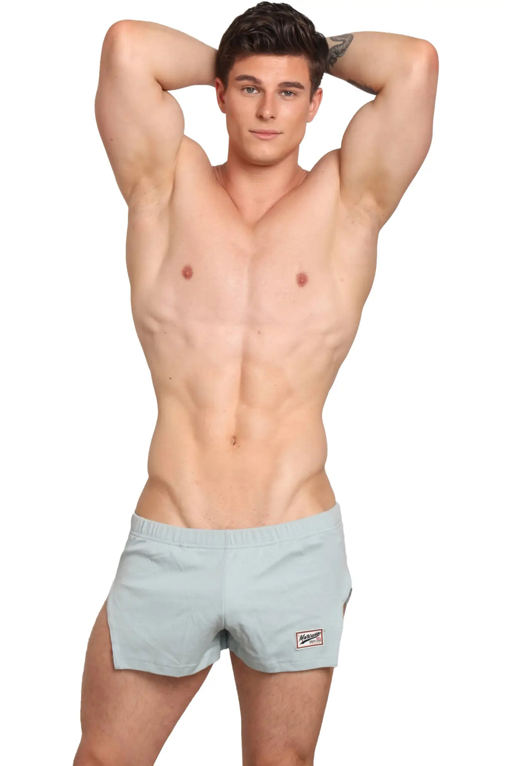 Marcuse Hansar shorts in light blue with a small black and white logo on the lower right leg for athletic use