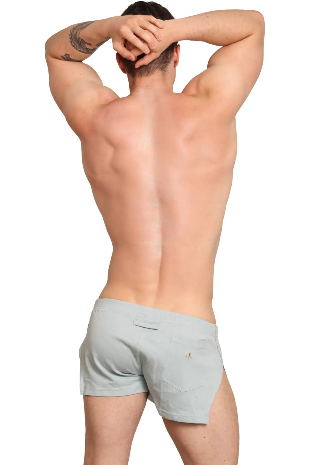 Light gray marcuse hansar athletic shorts showing the back side with small logo on the back pocket