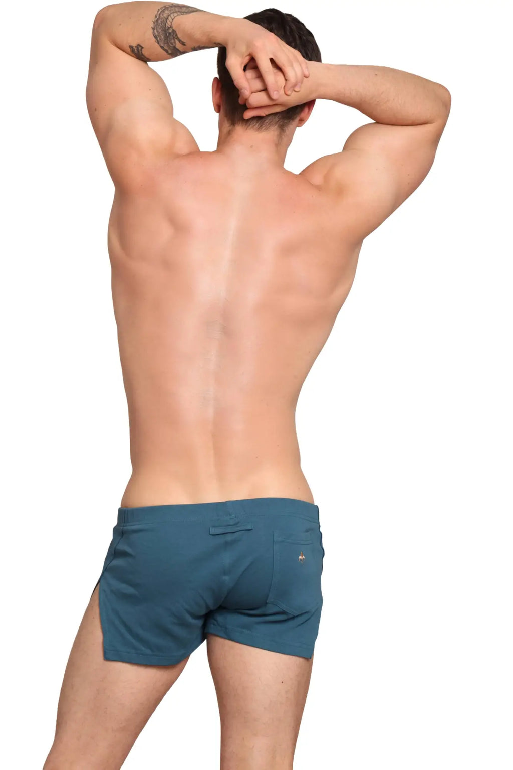 Teal slim-fitting marcuse hansar shorts showing back side with a small logo on the pocket for comfortable wear