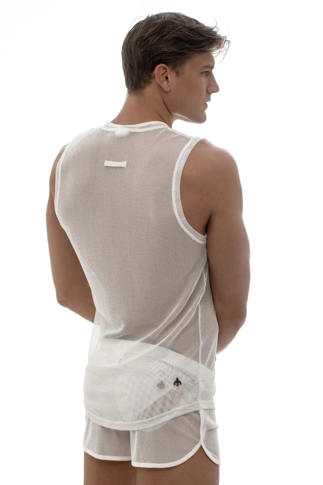 White mesh tank top by Marcuse featuring subtle sleek design and reinforced white trim on neckline and armholes