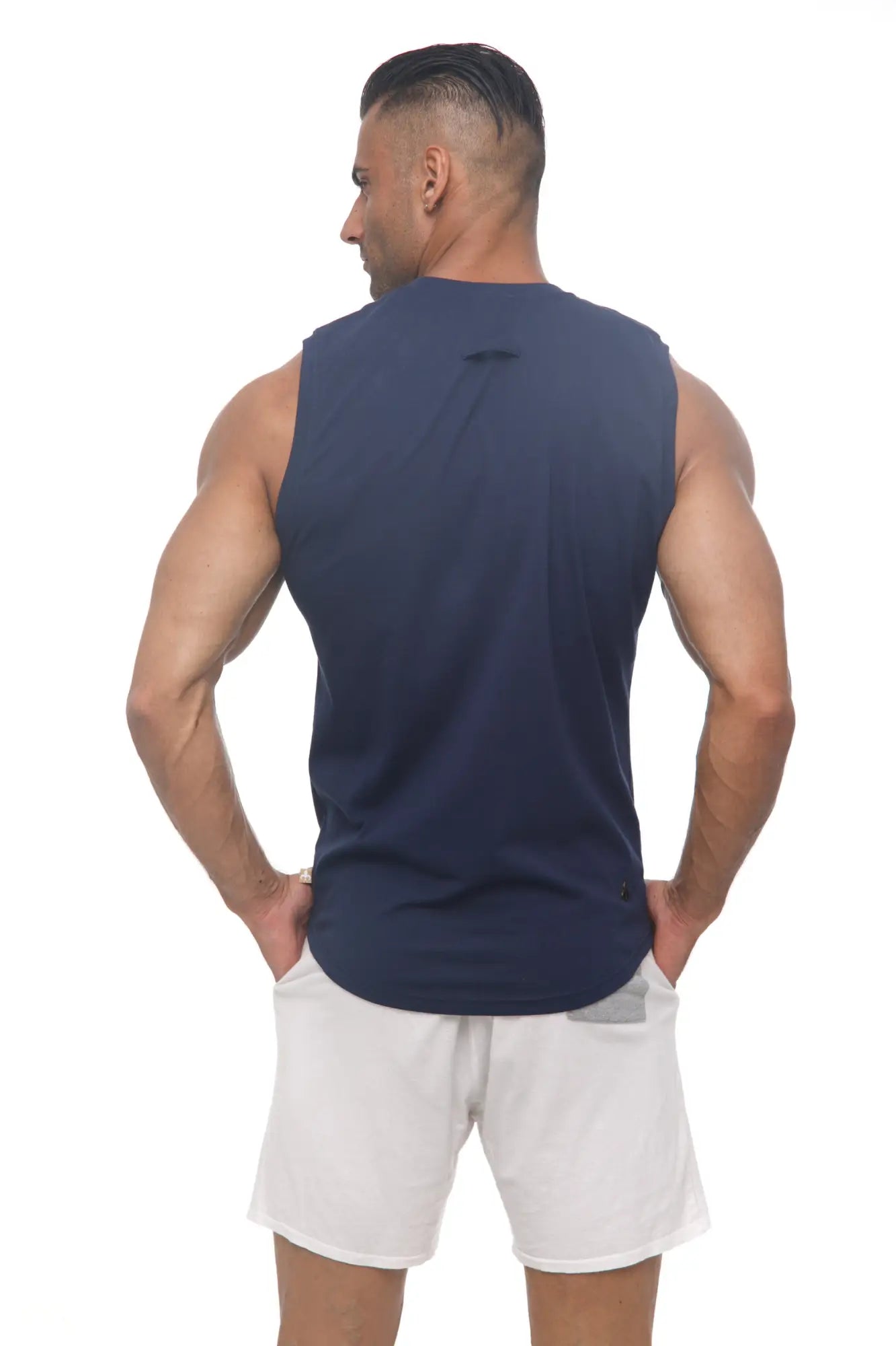 Navy blue marcuse hero tank top sleeveless athletic with subtle ribbed texture and small logo at neckline