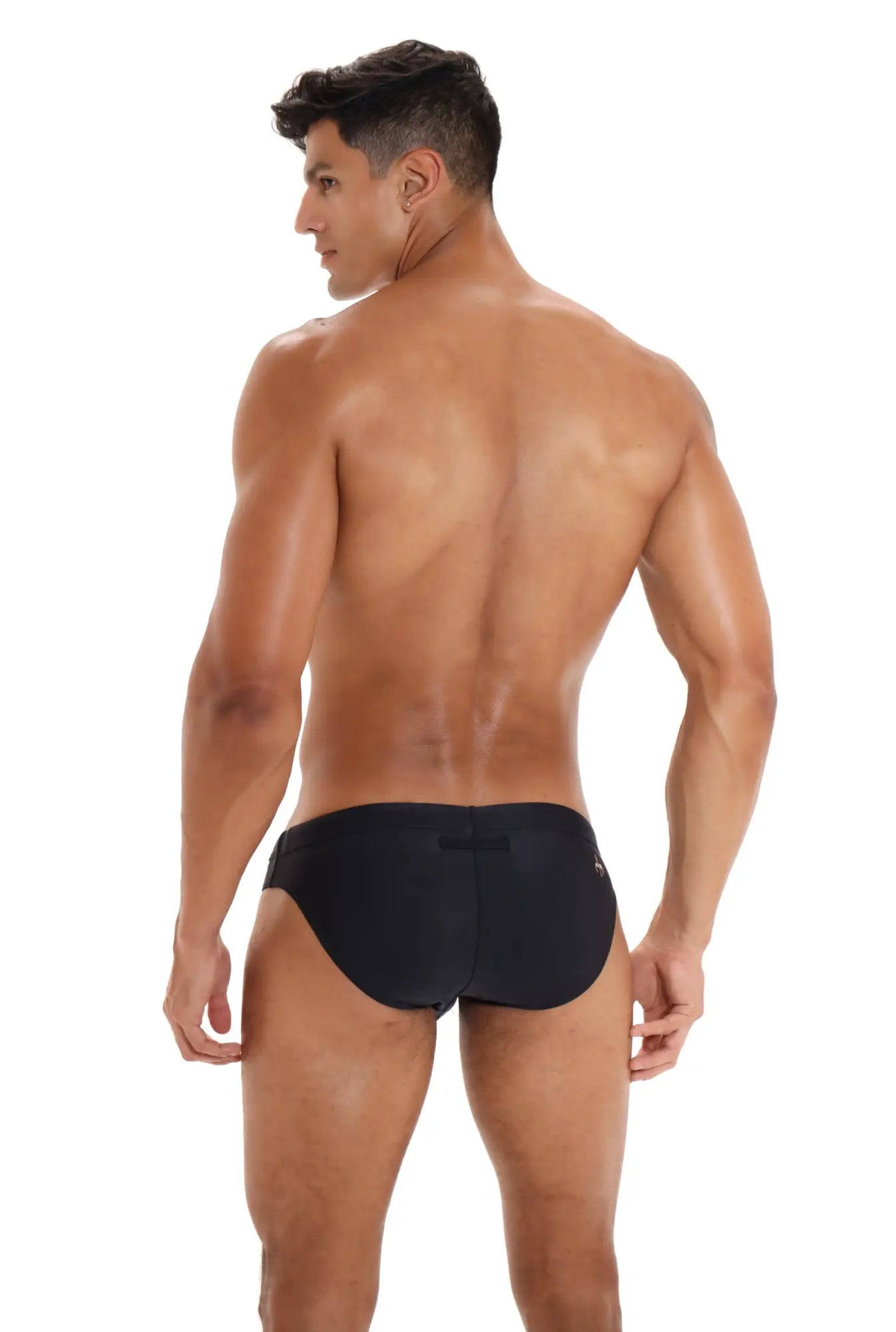 Black form-fitting marcuse homme bikini swimwear trunks with a sleek minimalist design for swimming and beachwear