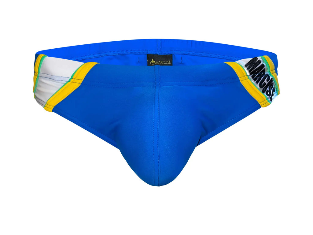 Bright blue marcuse homme bikini swimwear with bold yellow and white side stripes and black logo patch on waistband