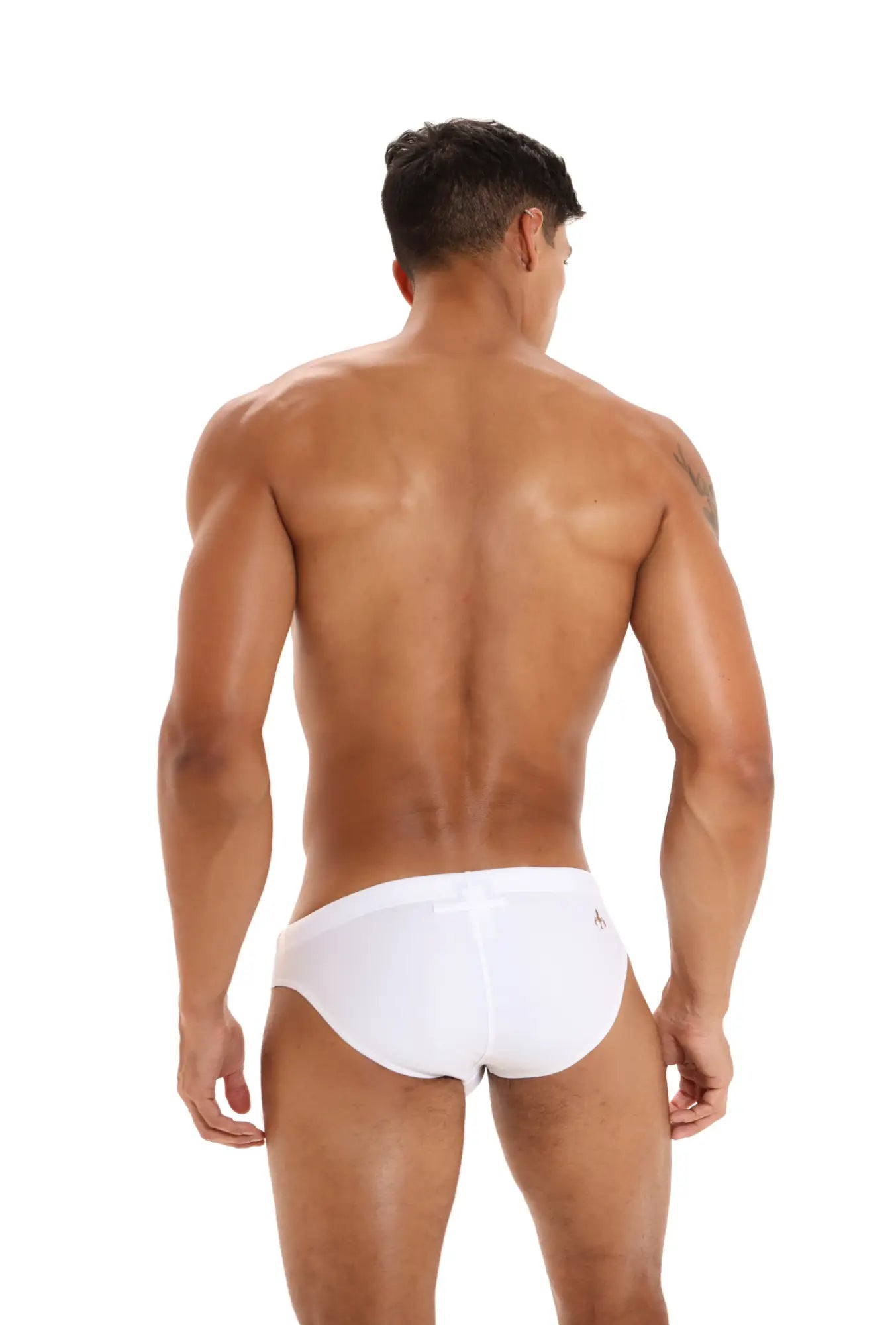 White briefs with a subtle logo on the back from Marcuse homme bikini swimwear collection