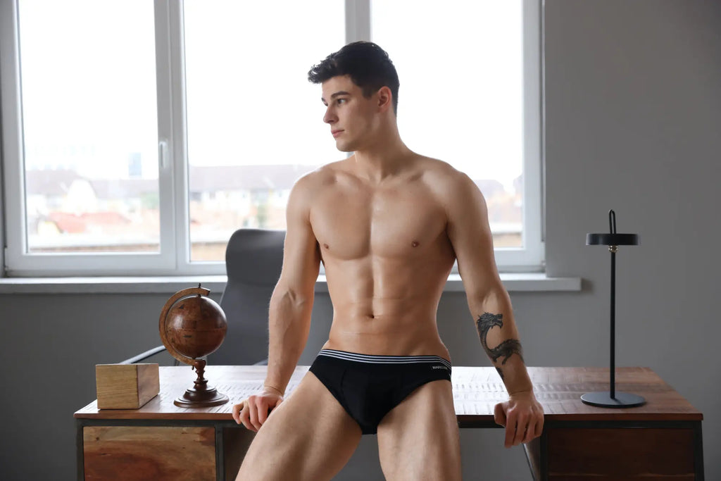 Black marcuse huxley brief underwear with white stripes made of comfortable fabric for everyday wear