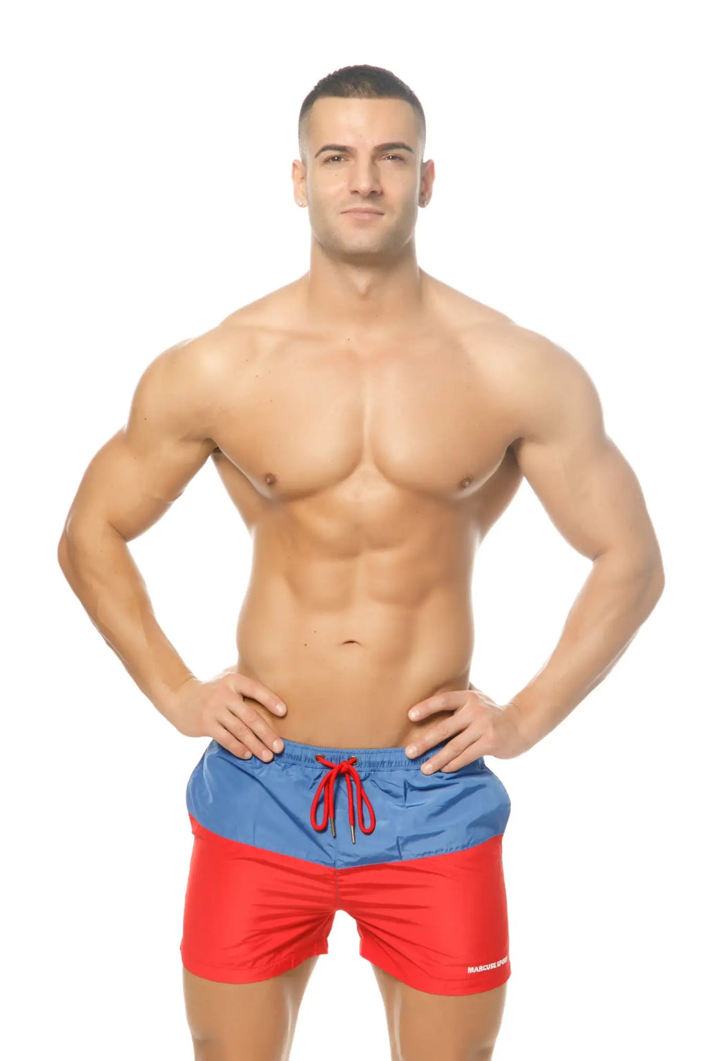 Blue and red two-tone swim trunks with matching red drawstring marcuse incas shorts for beach and pool use