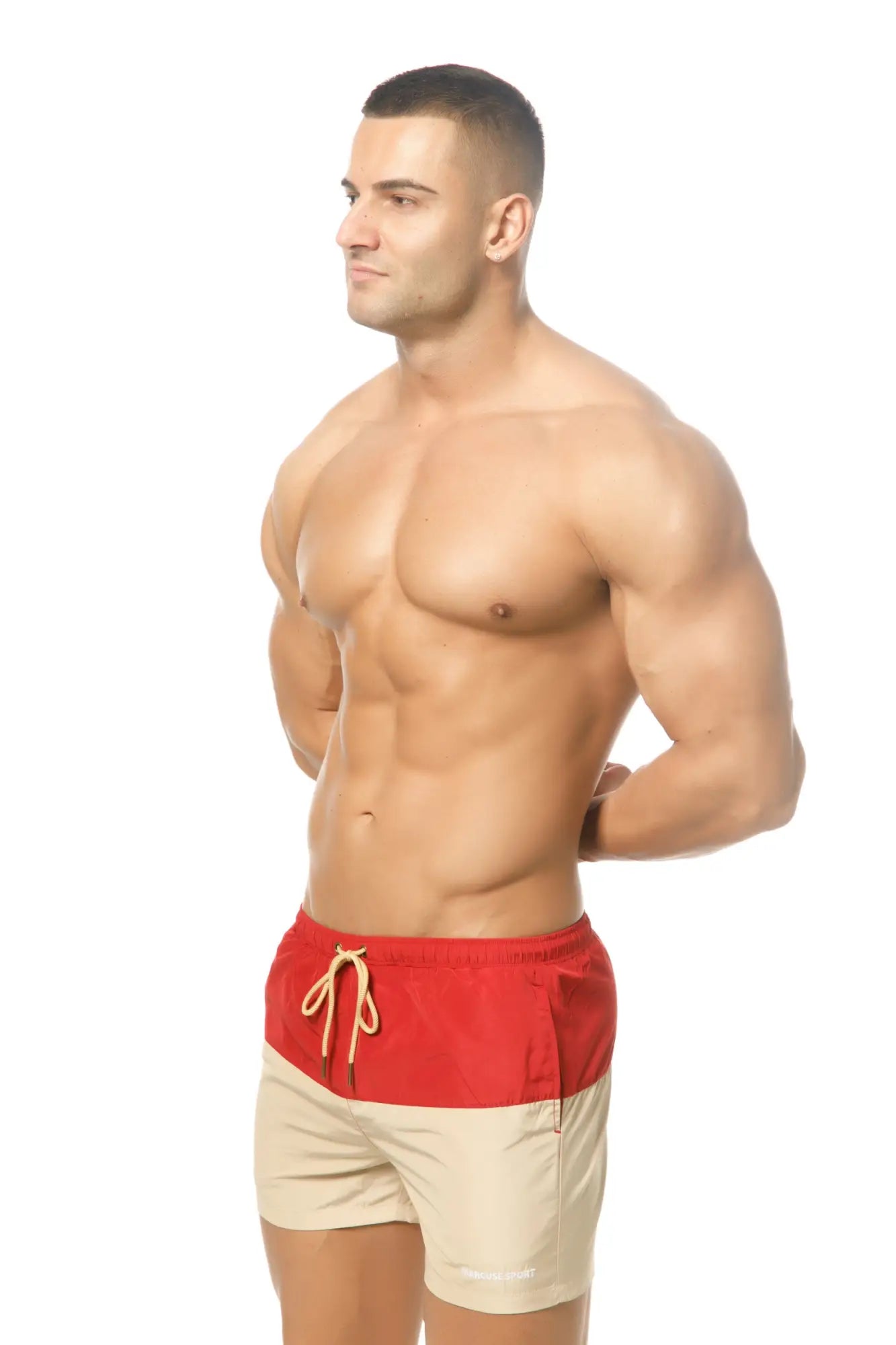 Red and beige two-tone Marcuse Incas swim trunks with drawstring waistband for comfortable beachwear