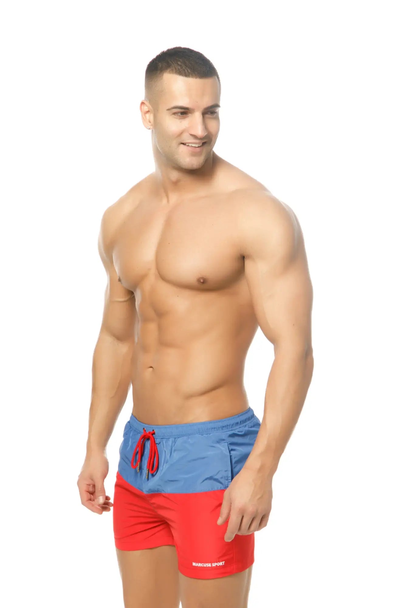 Red and blue two-tone Marcuse Incas swim trunks with red drawstring ideal for beach and swim activities