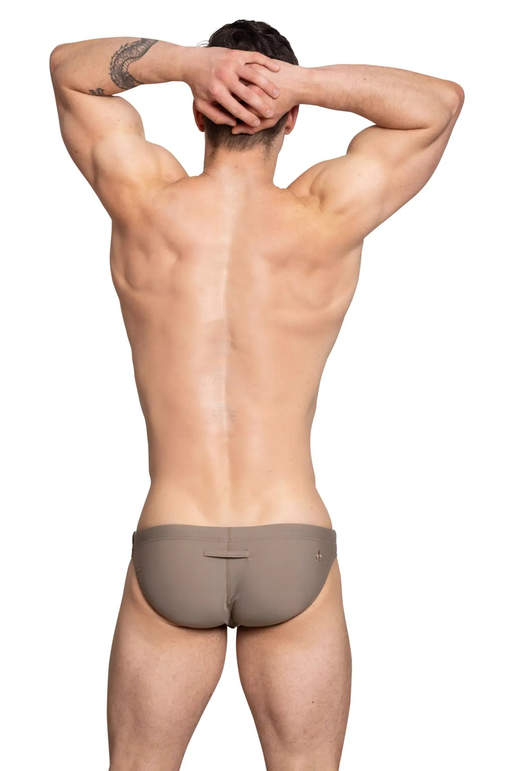 Beige marcuse inflate bikini swimwear with sleek form-fitting athletic briefs and subtle stitching details visible from front