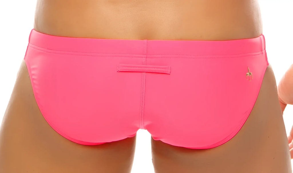 Marcuse Inflate bikini swimwear bright pink swim trunks with smooth stretchy fabric and small embroidered logo on side