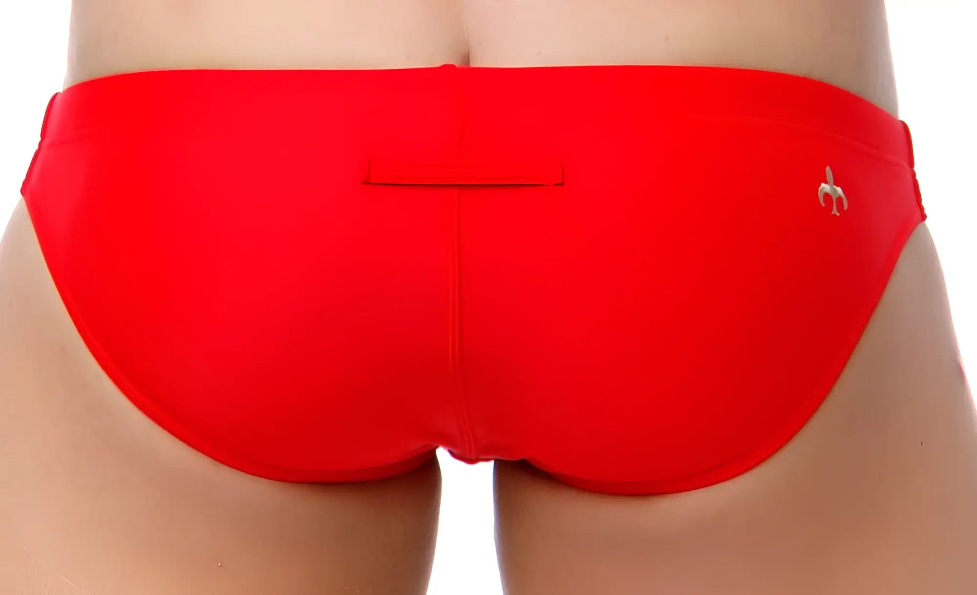 Bright red Marcuse Inflate bikini swimwear swim trunks with small metallic banana logo on the right hip