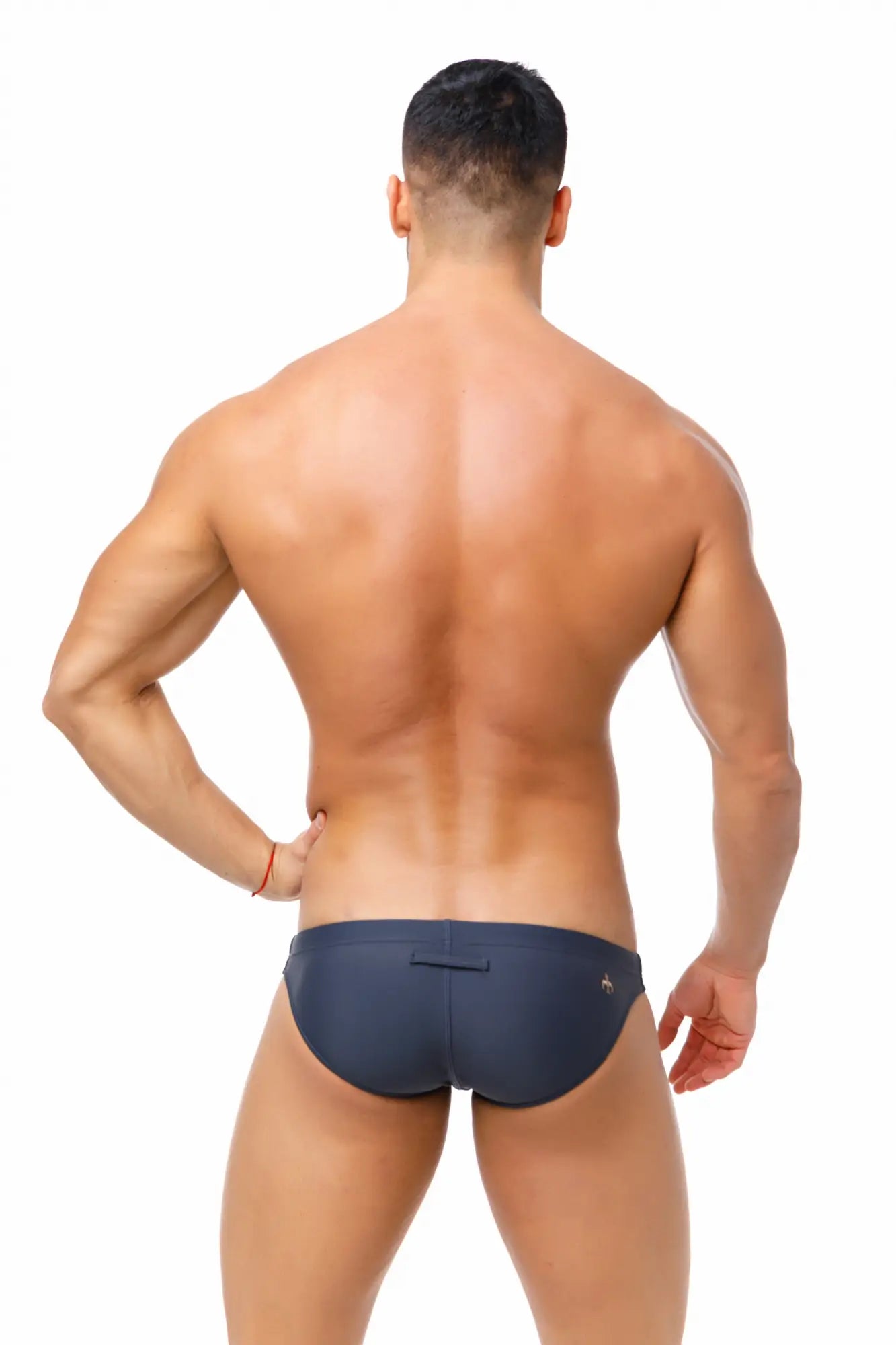 Navy blue Marcuse Inflate bikini swimwear briefs with a small gold logo on the side designed for swimming