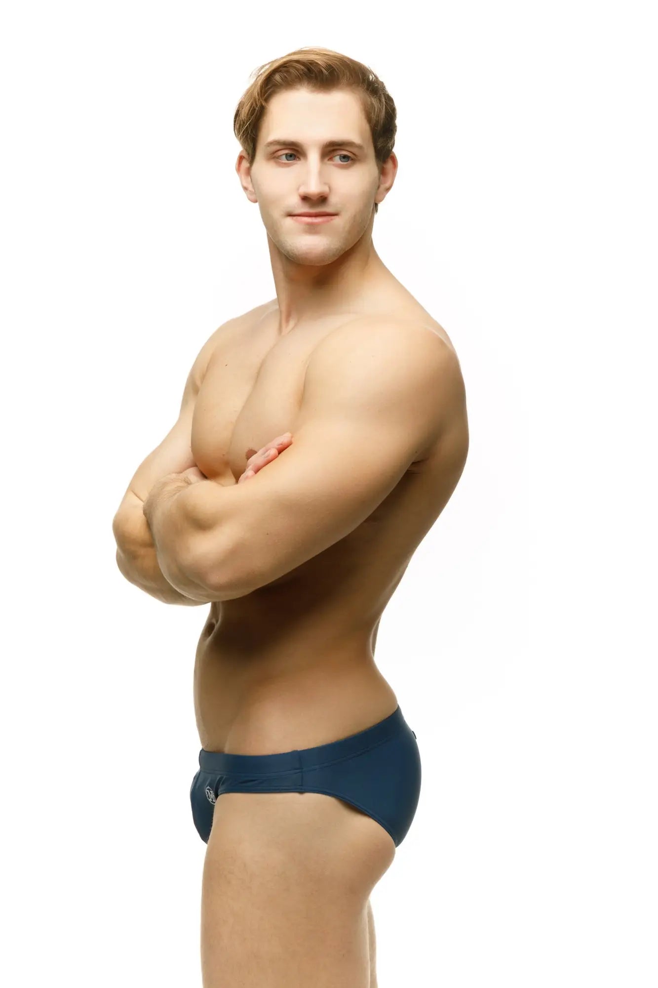 A pair of navy blue Marcuse Inflate bikini swimwear swim trunks with a sleek, form-fitting design